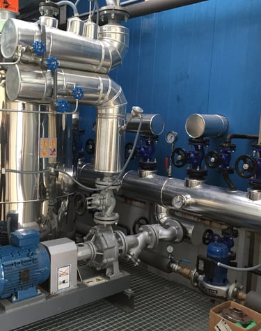 Sala de maquinas de aceite térmico a 300ºC en industria conservera