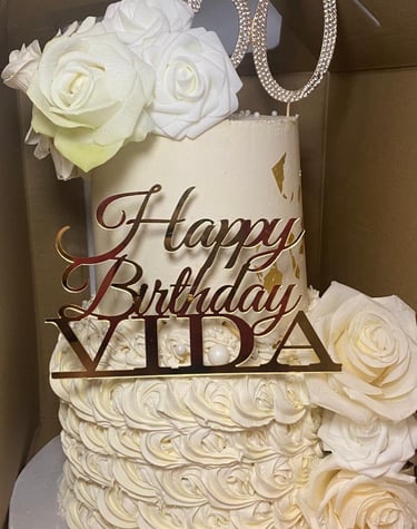a cake with a 50th birthday cake topper