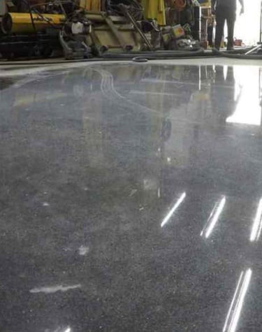 Traitement béton, ponçage et résines décoratives - solutions DG Services pour sols industriels & des