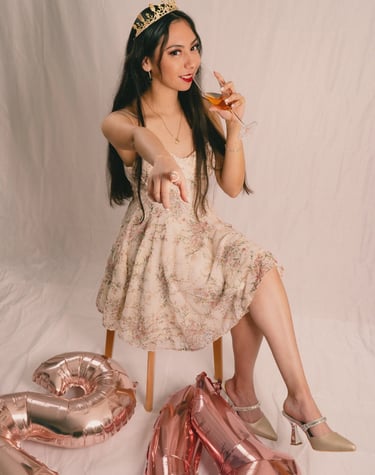 a woman in a tiablet and a crown crown