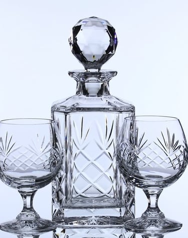 a glass decanter & crystal glasses