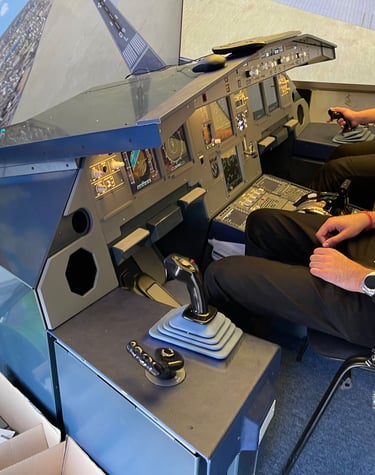two people sitting in a plane