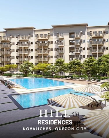 a hotel pool with lounge chairs and umbrellas