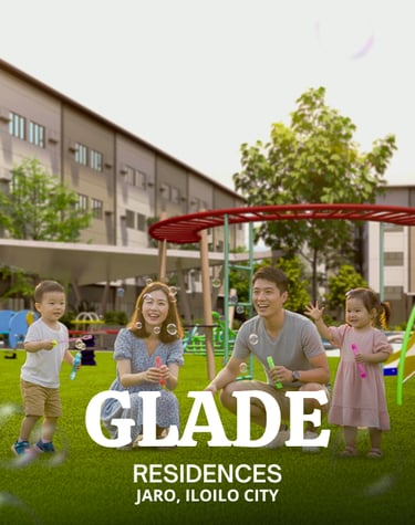 a family of four children playing with a kite