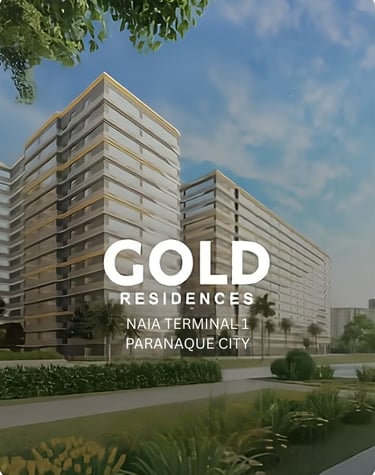 a building with a gold medal on the front and a blue sky in the background