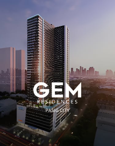 a building with a large white sign that says gem residence