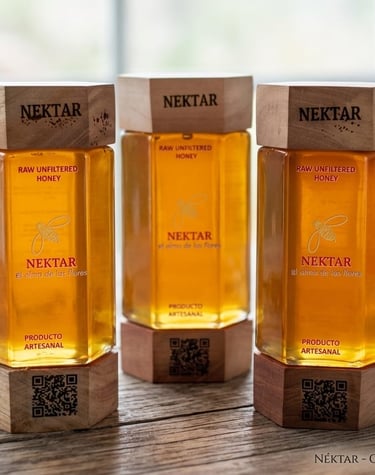 Three hexagonal jars of Nektar raw unfiltered artisanal honey with wooden lids on a rustic table.