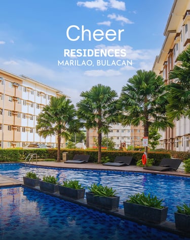 a pool with palm trees and a blue sky in the background