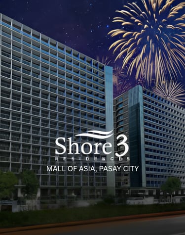 a large building with fireworks in the background