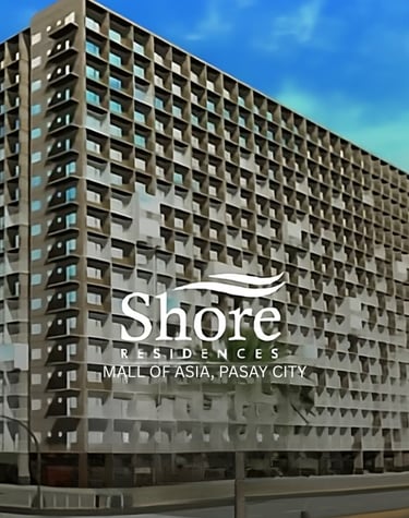 a large building with a large sign that says shore residences