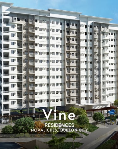 a large apartment building with a large white building in the background