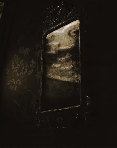 A mirror in dining room in Hatfield House at Hatfield.