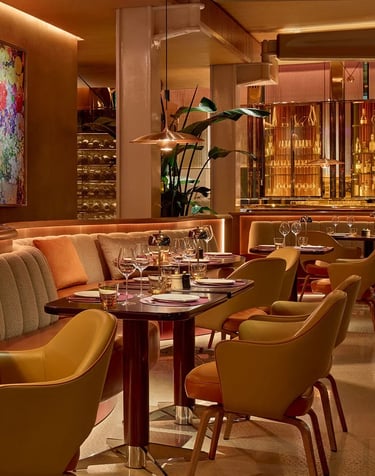 Luxurious fine dining at The Emory Hotel, featuring elegant decor and ambient lighting.