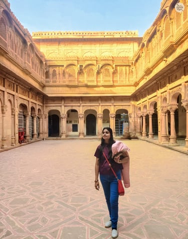 An open courtyard framing the calm beauty of Chandra Mahal