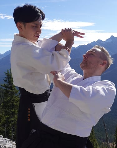 Rentaro Ishikawa performs an Aikido arm-lock throw