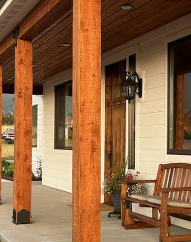 Custom Home patio with wood beams and trim in Montana