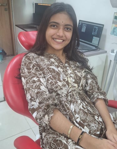  Comfortable and happy patient during dental treatment at Shree Dental Care in Shyamal, Ahmedabad