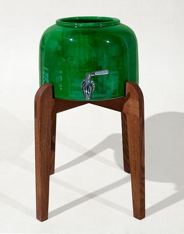 Elegant ceramic water dispenser with handcrafted wooden stand, highlighting the love and care in every detail