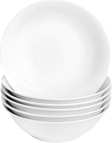 a stack of white plates with white plates and bowls