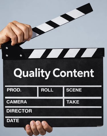 A person holding a movie clapperboard with the text Quality Content for video production marketing.