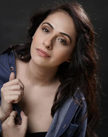 a woman in a denim jacket and jeans jacket