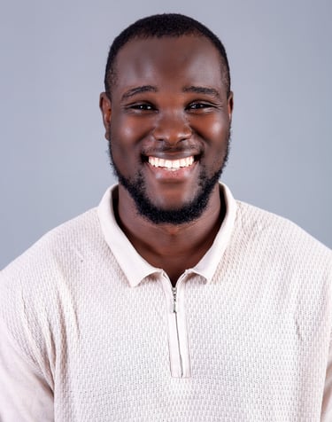 Deep Smilling Headshot Of Melvin Dain