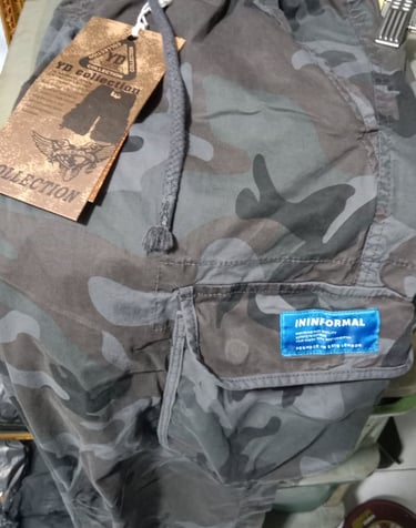 a cargo pants camo with a tag on it