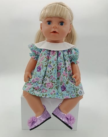 Zapf Big Sister doll in turquoise dress