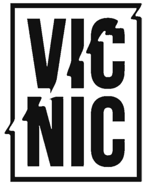 Minimalist black and grey Vic Nic logo design with bold typography in a rectangular frame.