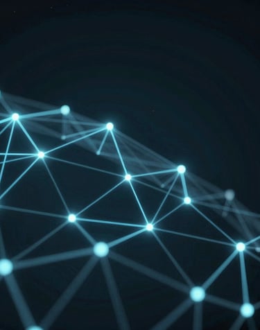 A modern office desk with a laptop, phone, and a cup of coffee, symbolizing professional communication.