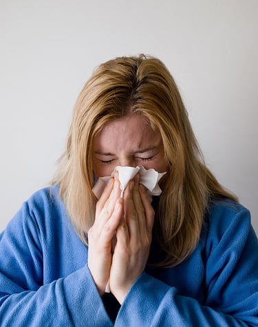 woman with allergy from household dust