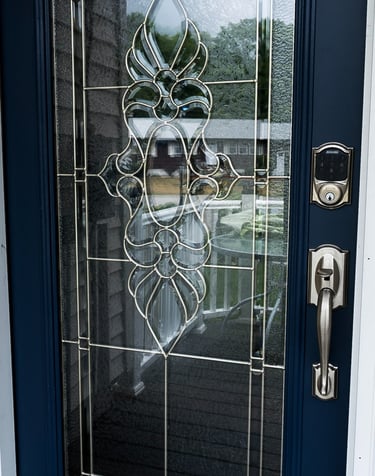 a door with a glass door and a door handle