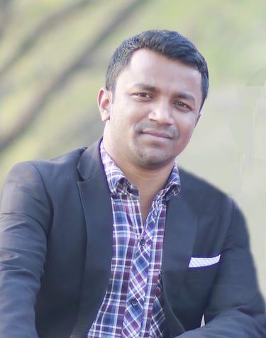 a man in a suit and tie is posing for a picture