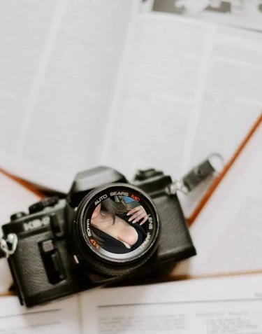 a camera lens with beautiful girl