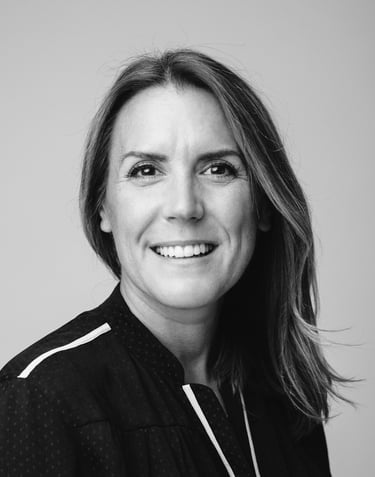 Black and white headshot of a white, middle aged women who is a counsellor