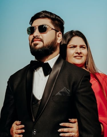 Couple posing in a rustic setting for their pre wedding photo