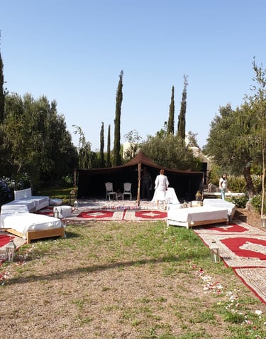 a wedding ceremony with a red carpet and a red carpet