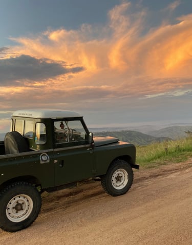 a land rover above the cliffs of Monteseel