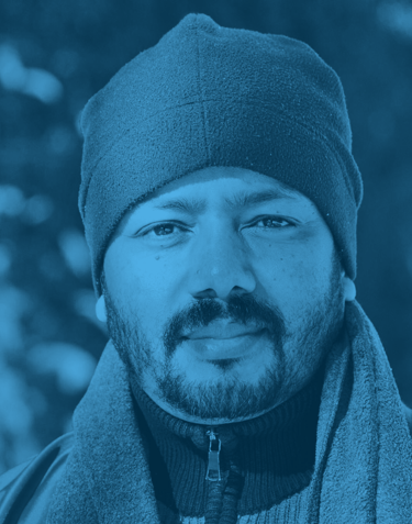 a man with a beard and a hat on