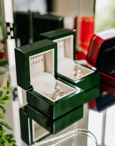 Close-up of wedding rings in boxes