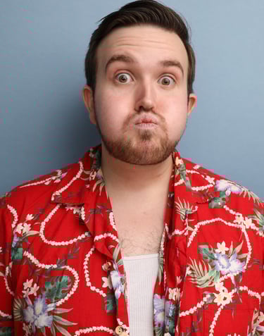 Cade MacFee actor headshot on a blue background