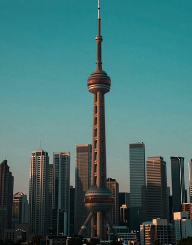 An elegant, cinematic shot of a modern city skyline at dusk, highlighting iconic North American architecture. Deep royal green and vibrant teal tones dominate the sky, symbolizing a prosperous and stable financial future.