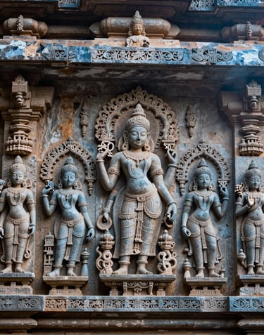 A close-up shot of intricate stone carvings on a historic South Asian / Indian temple wall, with soft shadows and mist blue highlights. Professional architectural photography.
