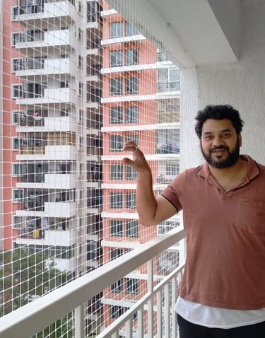 Satisfied Customer of arjilli safety nets with net installed on a balcony
