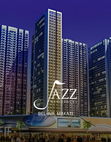 Luxury high-rise Jazz Residences condo towers at night in Bel-Air, Makati CBD.