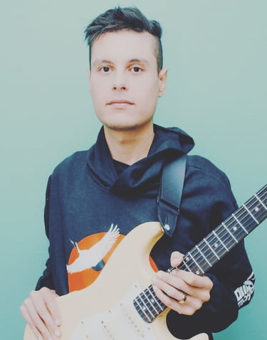 a man with a guitar and a guitar