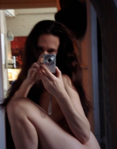 self portrait of Jennadea with old camera