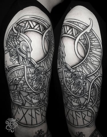 Tatouage sur le bras du combat entre Thor et Jormungandr pendant le Ragnarok.
