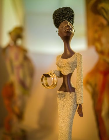 muñeca con anillos