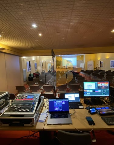a table with a laptop and a laptop computer